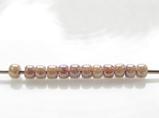 Picture of Japanese seed beads, round, size 11/0, Toho, opaque pink, amethyst marbled