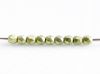 Picture of 2x2 mm, Czech beads,  a soup of different round shapes, limelight or light yellow-green, opaque, saturated metallic