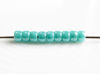 Picture of Czech seed beads, size 8, opaque, turquoise or medium blue green, luster