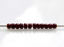 Picture of Japanese seed beads, round, size 11/0, Toho, opaque, oxblood or deep red