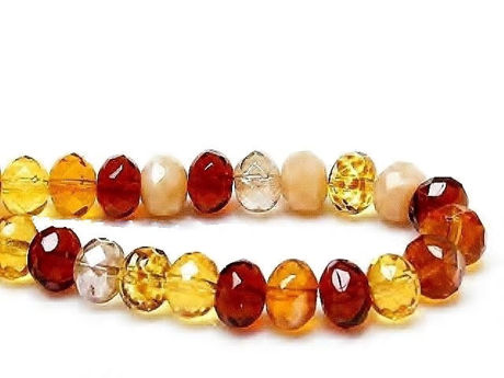 Picture of 6x9 mm, Czech faceted rondelle beads, shades of warm topaz colors, from creamy white to brown