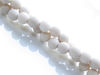 Picture of 6x6 mm, round, gemstone beads, river stone, antique white, natural, frosted