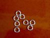 Picture of 4 mm, open jump rings, 21 gau, sterling silver, 2 pieces