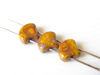 Picture of 7.5x7.5 mm, fan-shaped beads, Ginkgo leaf, Czech glass, 2 holes, opaque, yellow, picasso finishing