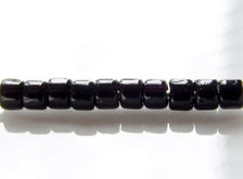 Picture of Czech cylinder seed beads, size 10, opaque, jet black