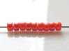 Picture of Czech seed beads, size 8, opaque, light coral orange, pearl shine